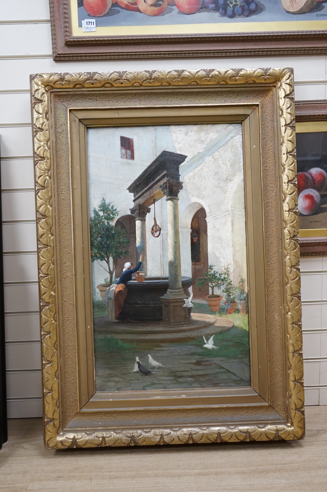 Late 19th century, Italian School, oil on board, Woman at a well, inscribed ‘Roma’ and dated 1891, 78 x 46cm, ornate gilt framed